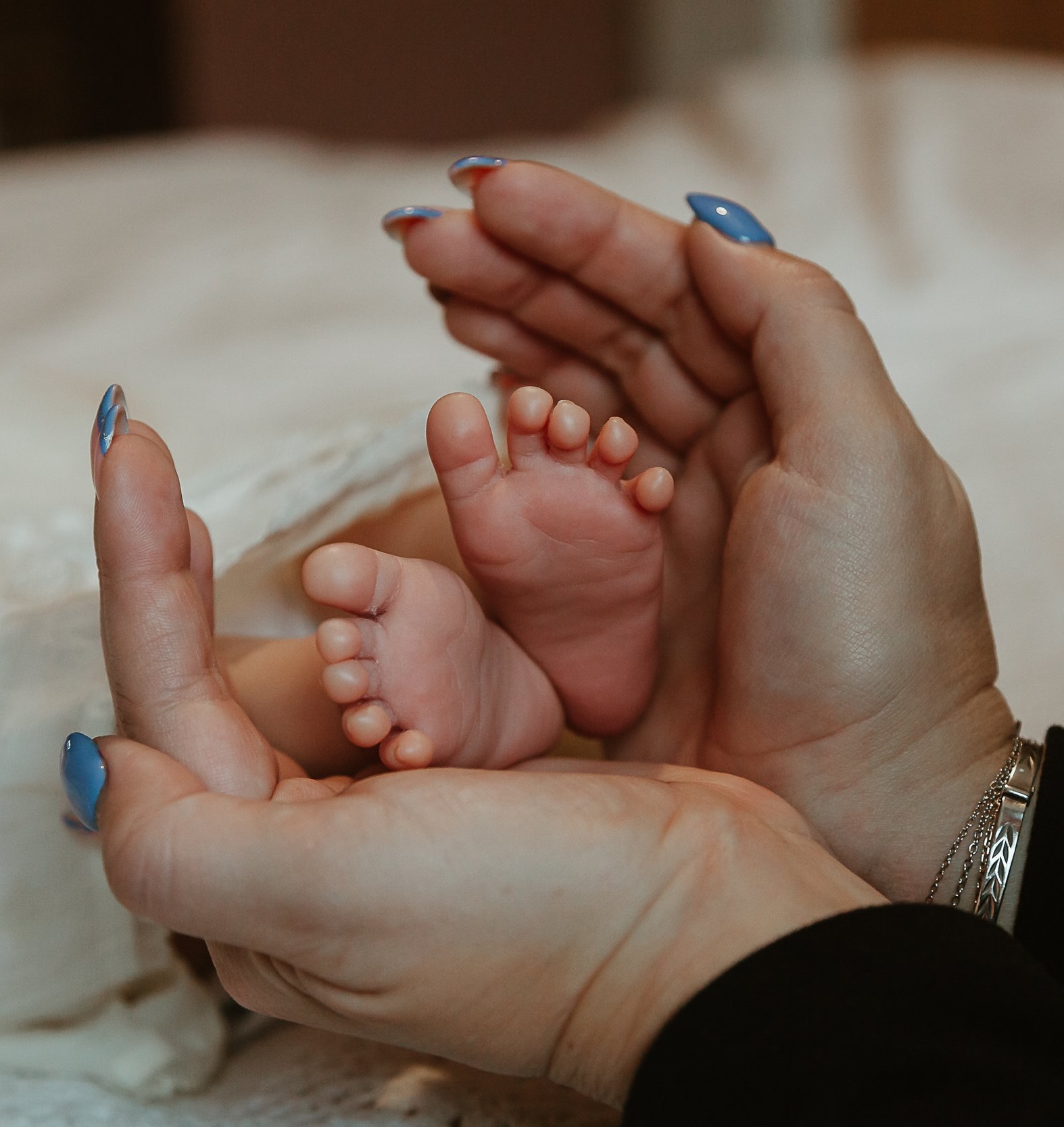 A mother holding newborn